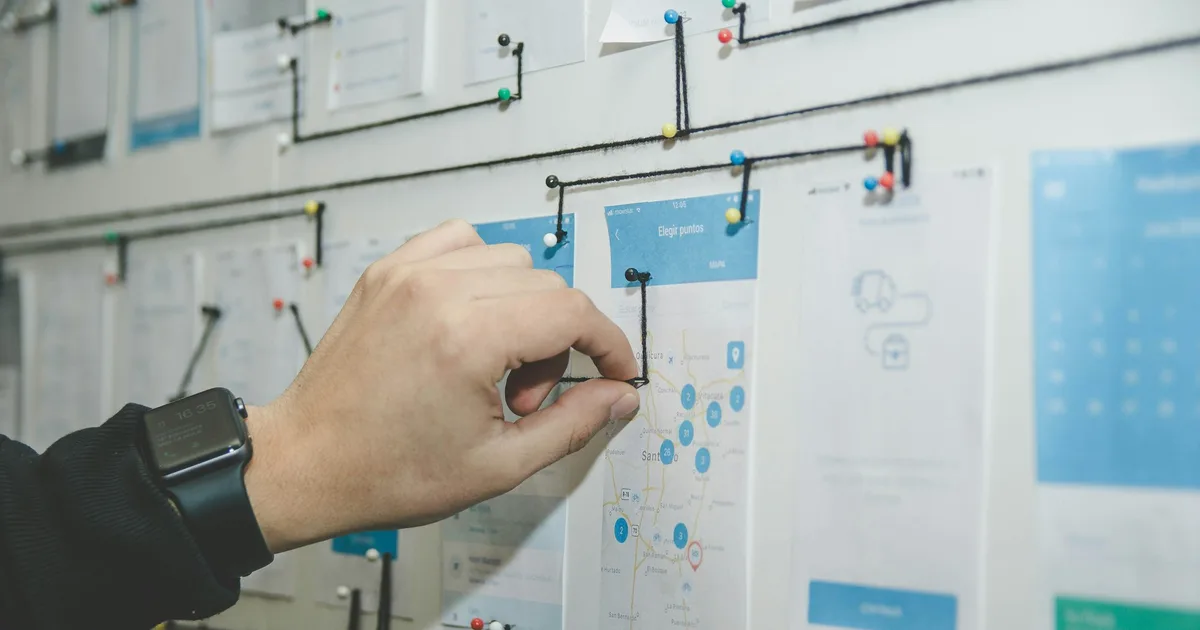 A planning wall covered in task sticky notes